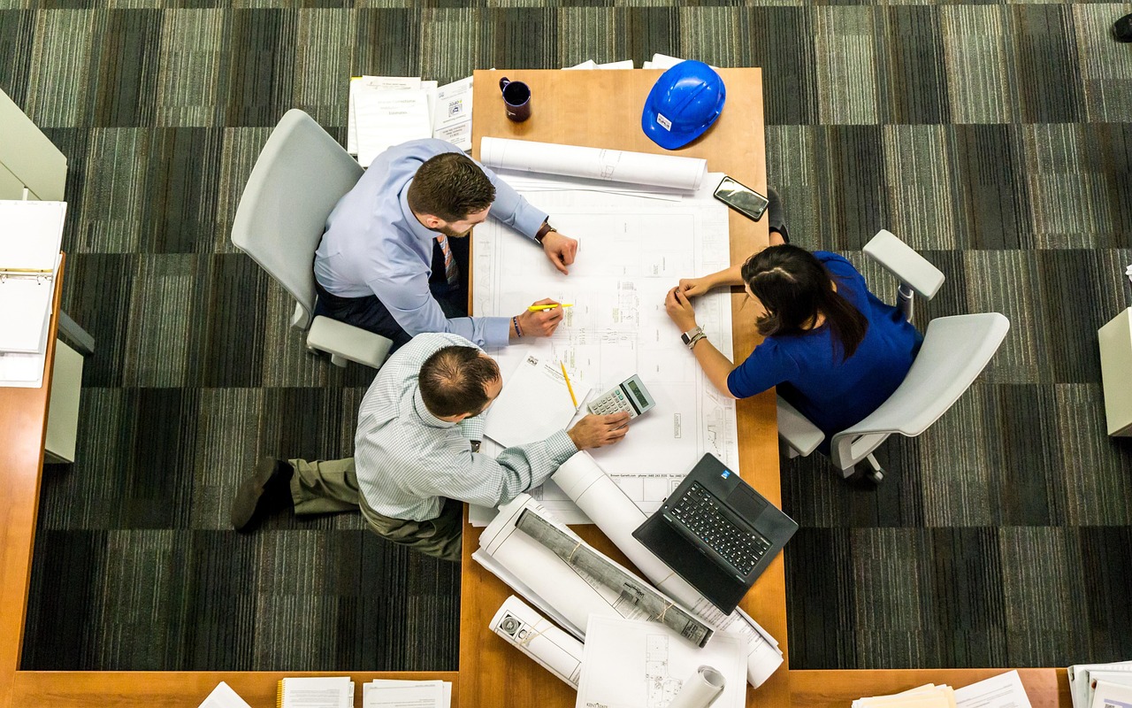 Meeting, business, architect — White Label PPC Demystified: Everything You Need to Know